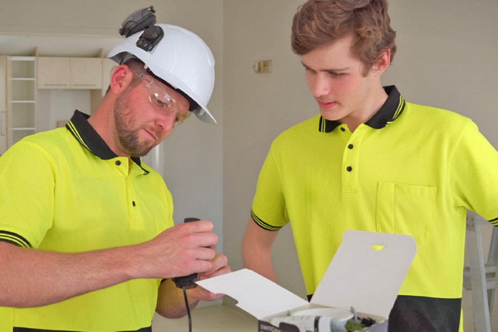 Trade apprentice working on site during practical training